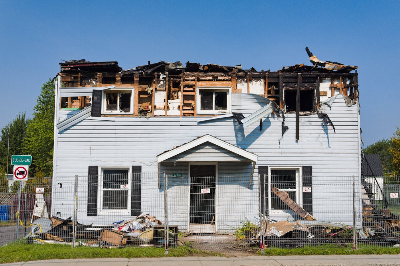 An image of the roof of a house impacted by a storm.